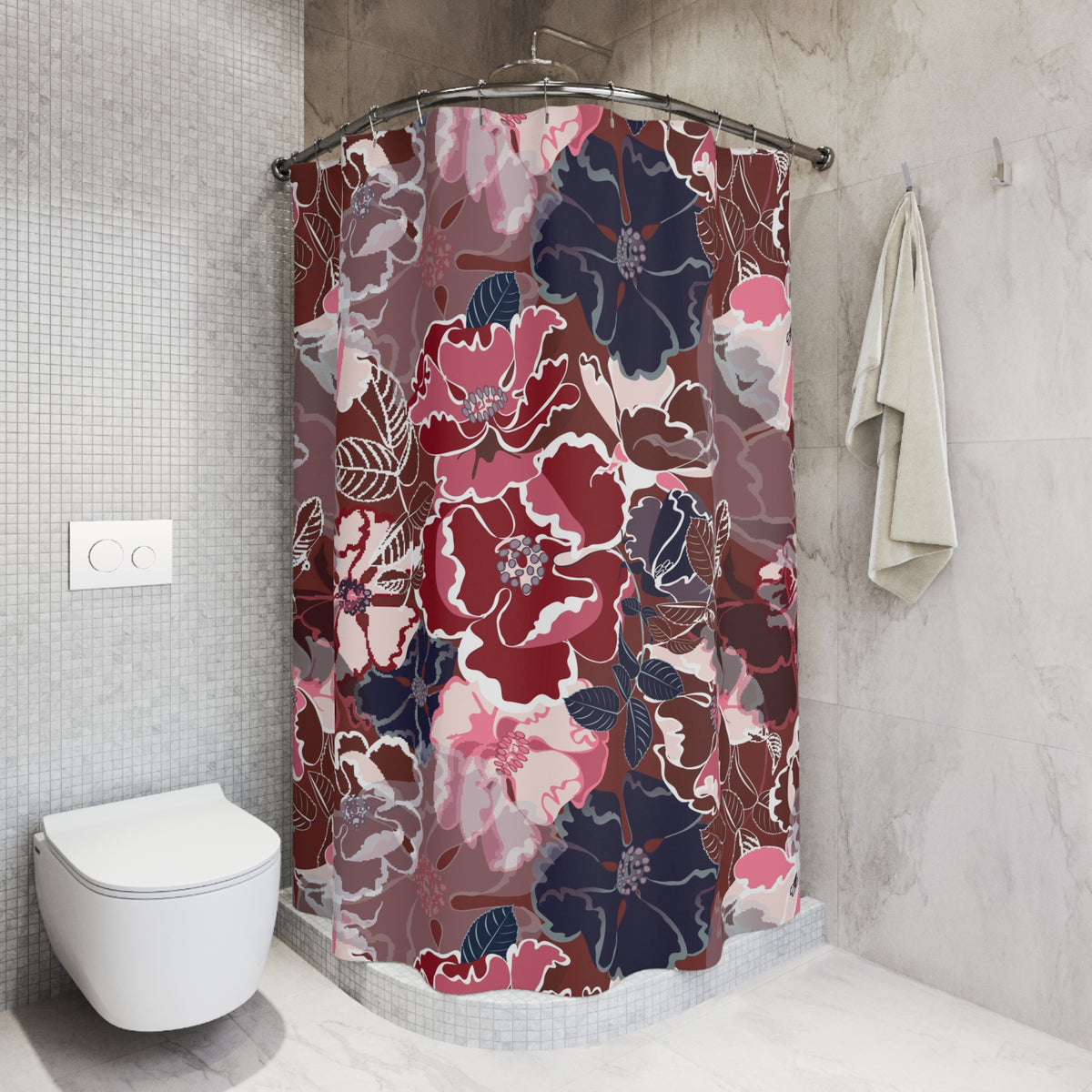 a bathroom with a shower curtain adorned with a floral pattern in shades of red, pink, and blue. The shower curtain is hanging on a rod next to a towel. The bathroom also includes a toilet and a sink.