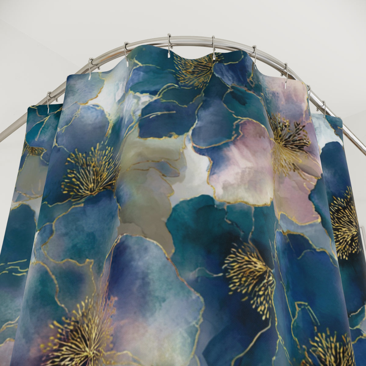 a shower curtain with a vibrant floral pattern in shades of blue, pink, and gold.