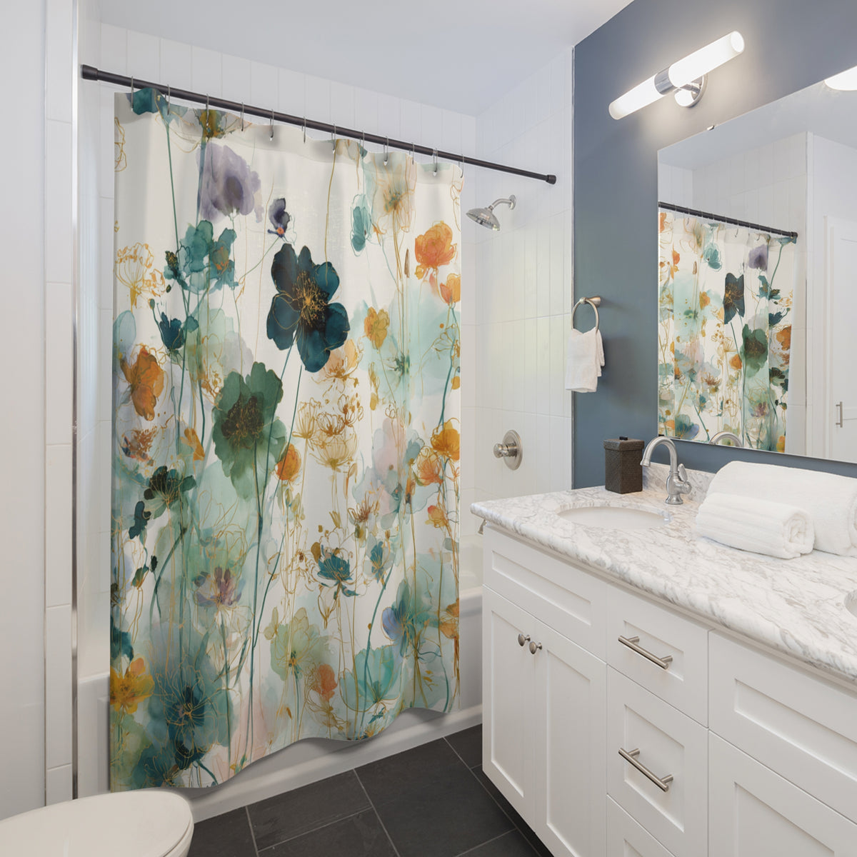 a bathroom with a shower curtain featuring a floral pattern in shades of green, blue, and orange. The bathroom has white cabinets, a marble countertop, and a sink with a mirror above it.