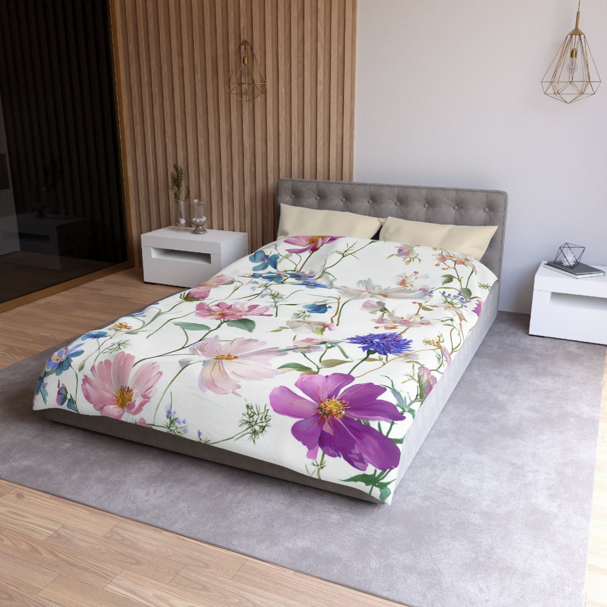 a bedroom with a bed, white nightstands, and a wooden wall. The bed has a floral comforter with pink and purple flowers.