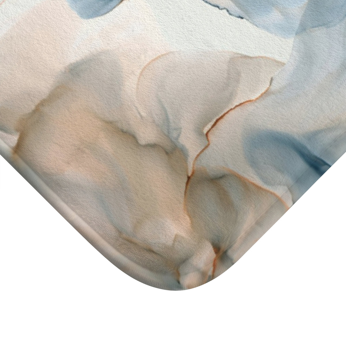 a close up of a piece of art on a white surface