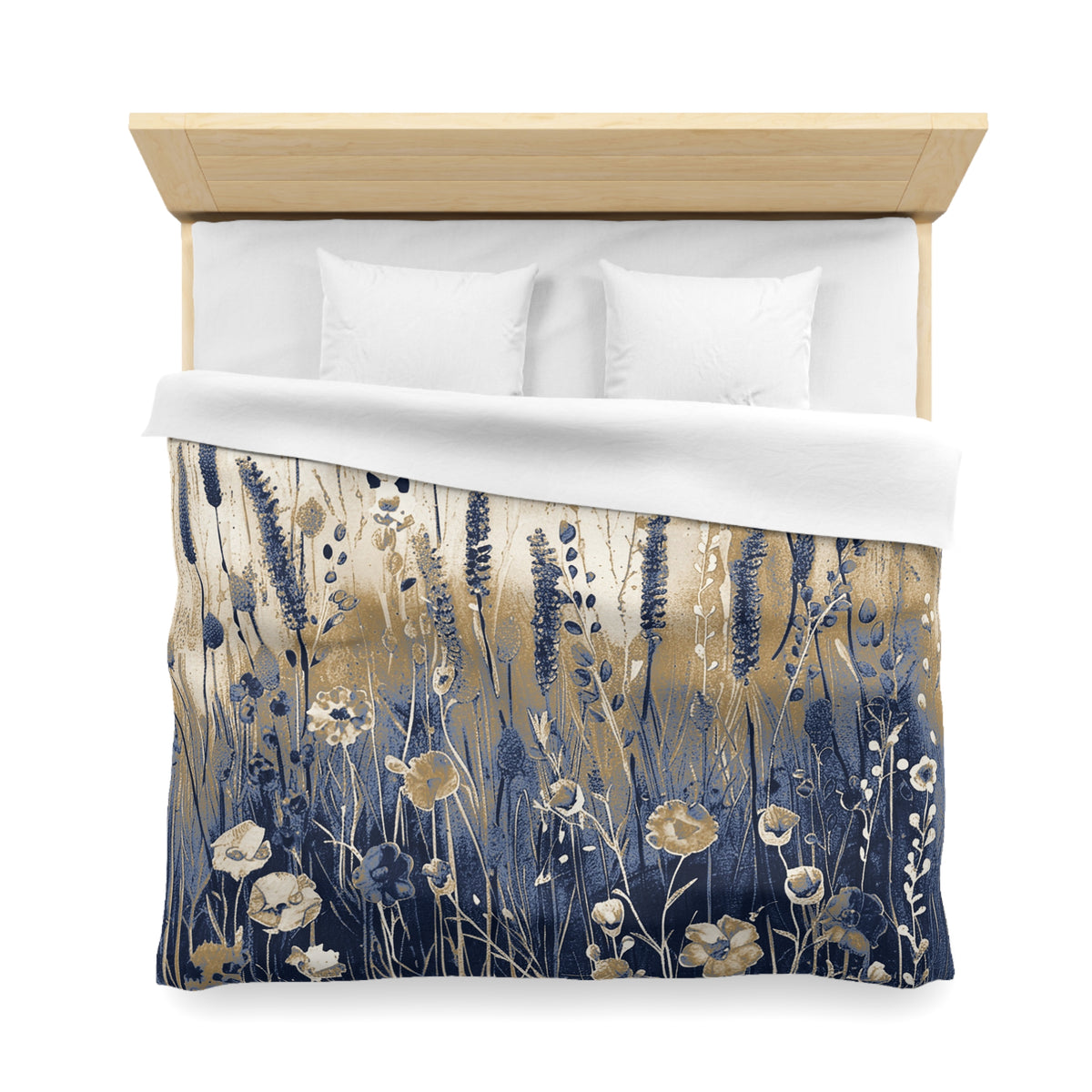 a bed with a floral patterned comforter and pillows.