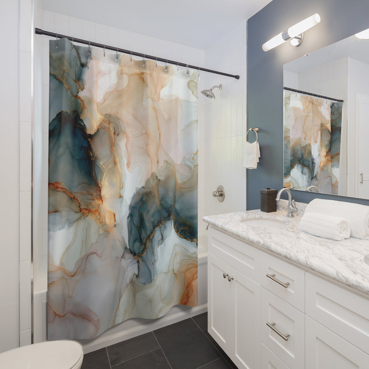 a modern bathroom with a white vanity, marble countertop, and a shower curtain with an abstract, colorful design.