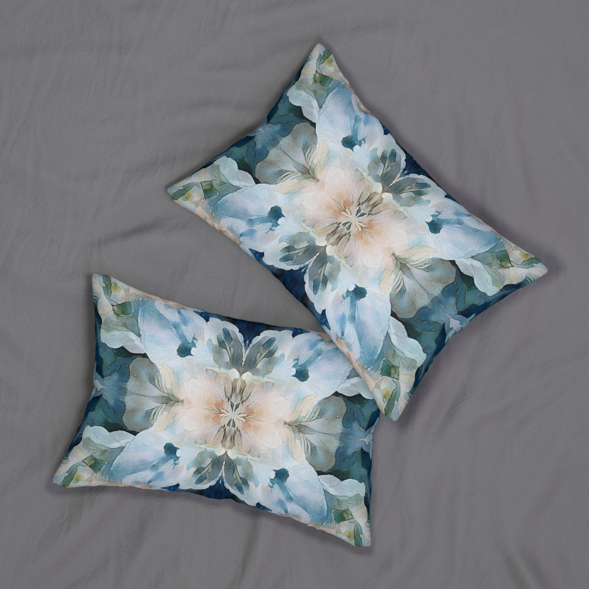 two decorative pillows with a floral pattern on a grey background.