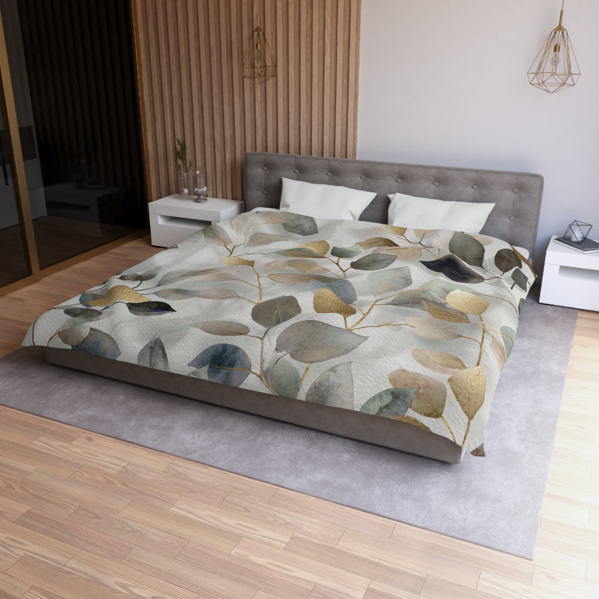 a modern bedroom with a large bed covered in a patterned comforter featuring a leaf design in shades of green and brown. The bed is positioned against a wall with a wooden panel, and there are two nightstands on either side of the bed. The room has a minimalist and clean design, with a gray headboard and a gray carpet on the floor.