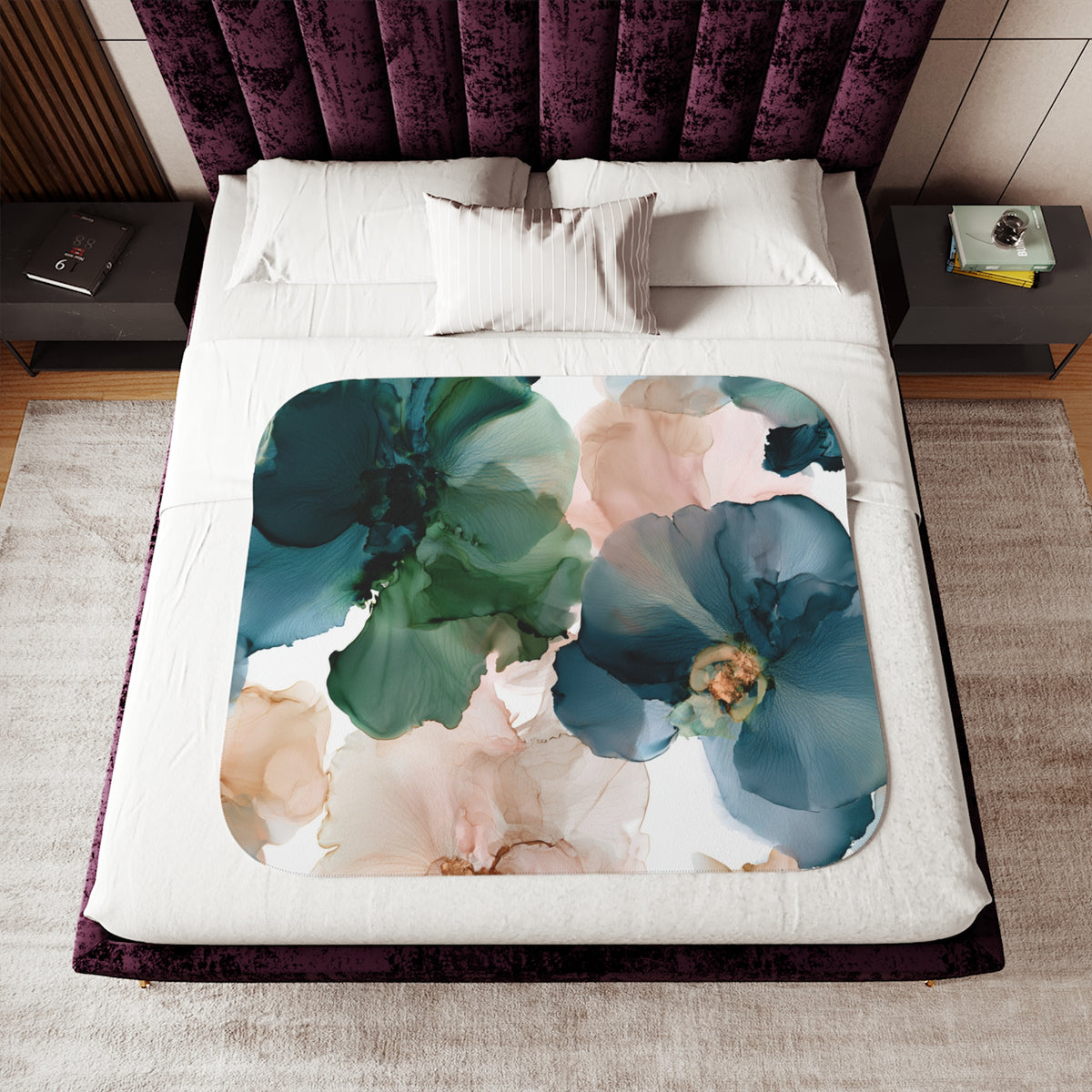 a bed with a floral design on it