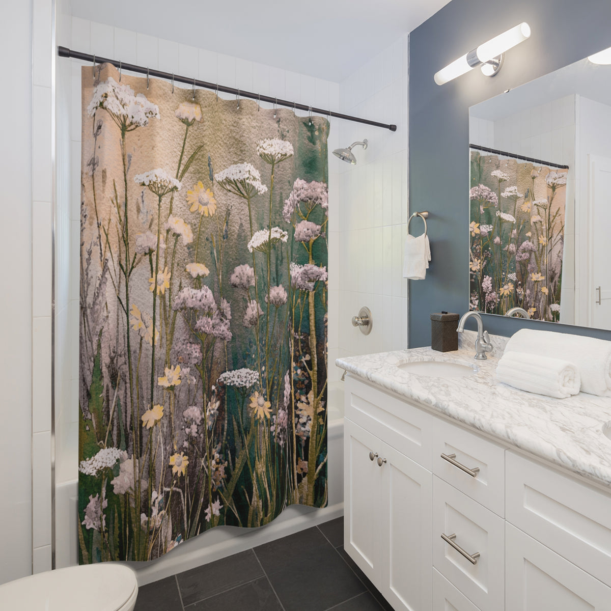 a bathroom with a shower curtain featuring a floral pattern.