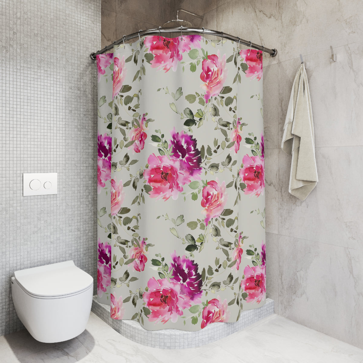 A bathroom with a floral patterned shower curtain, a white toilet, and a towel rack.