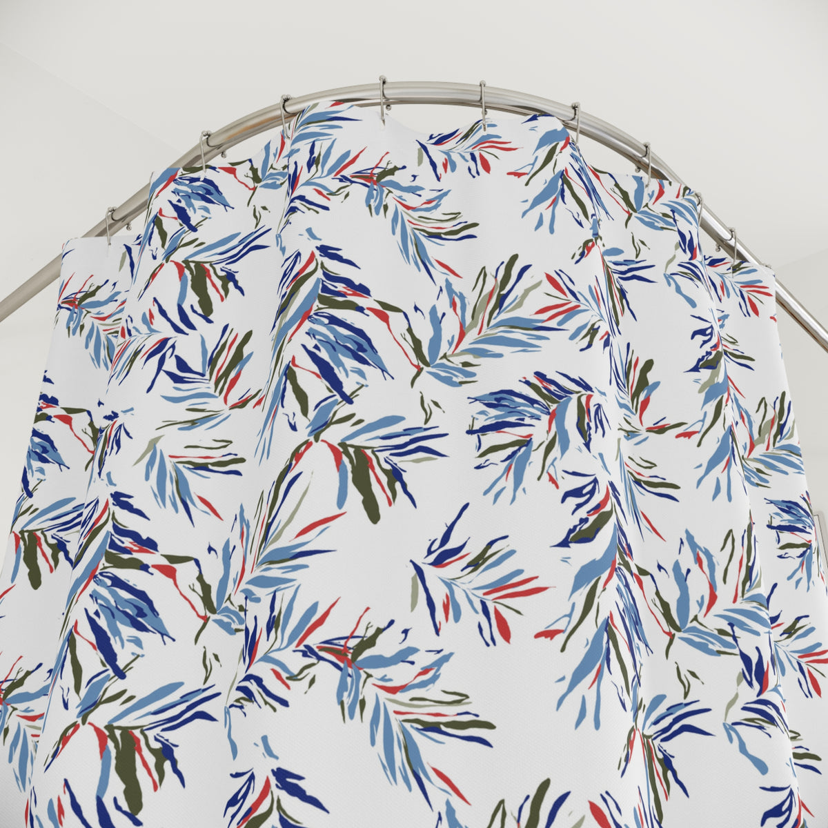 a shower curtain with a colorful, abstract floral pattern in shades of blue, green, and red.