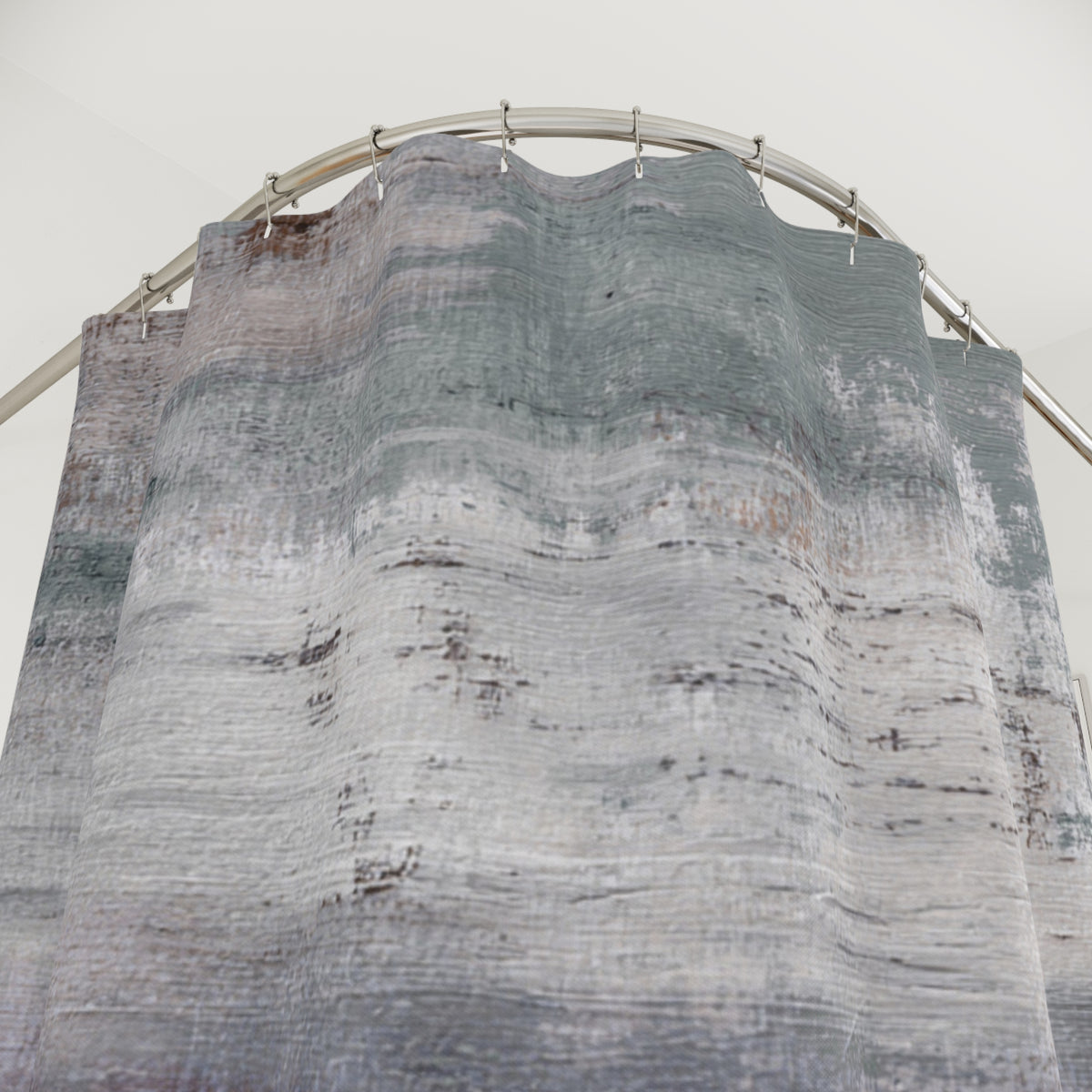 a curved, textured curtain with a metallic frame, hanging from a rod.