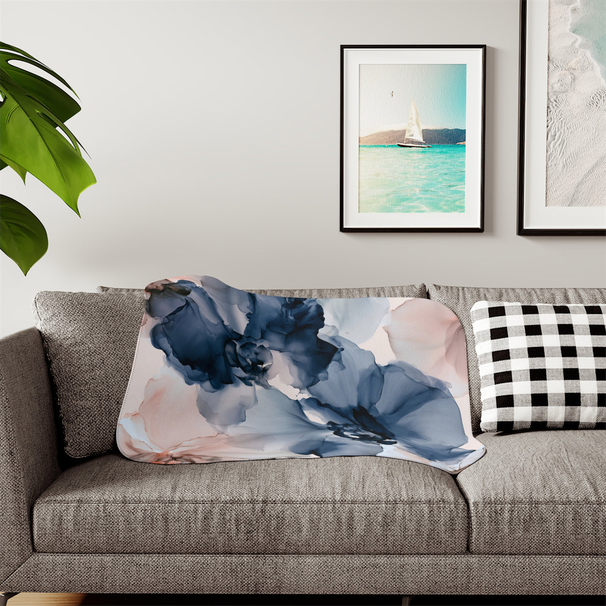 a living room with a couch and a painting on the wall