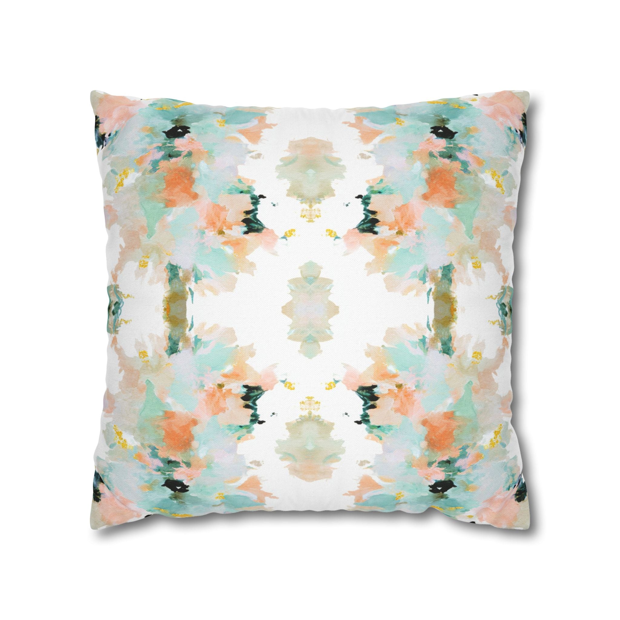 a square pillow with a vibrant abstract pattern in shades of green, pink, and blue.