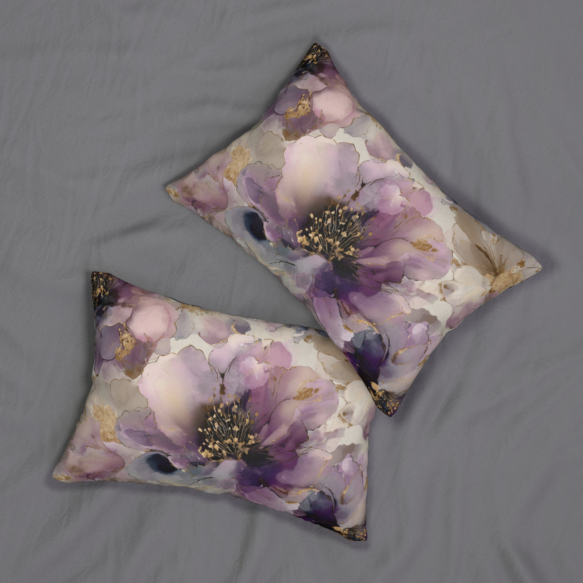 two decorative pillows with a floral pattern on a grey background.