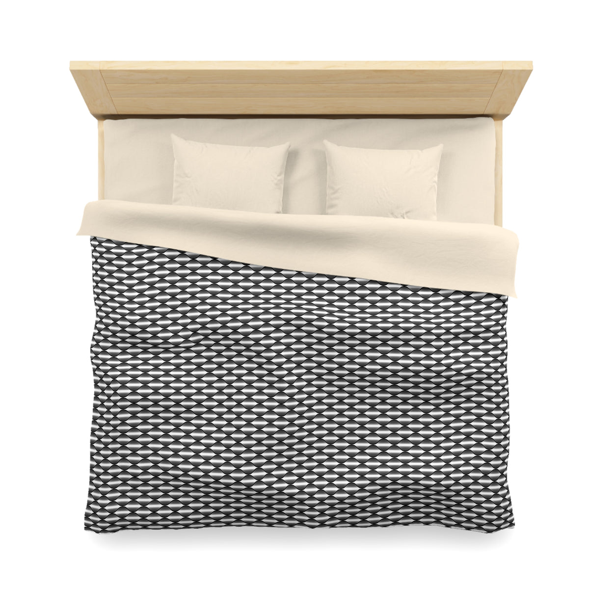a neatly made bed with a black and white patterned comforter and two pillows.