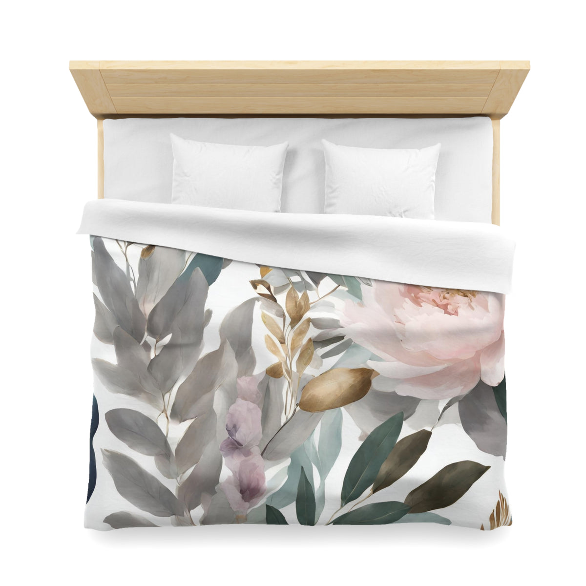 a bed with a white comforter and a floral print on the bedding.