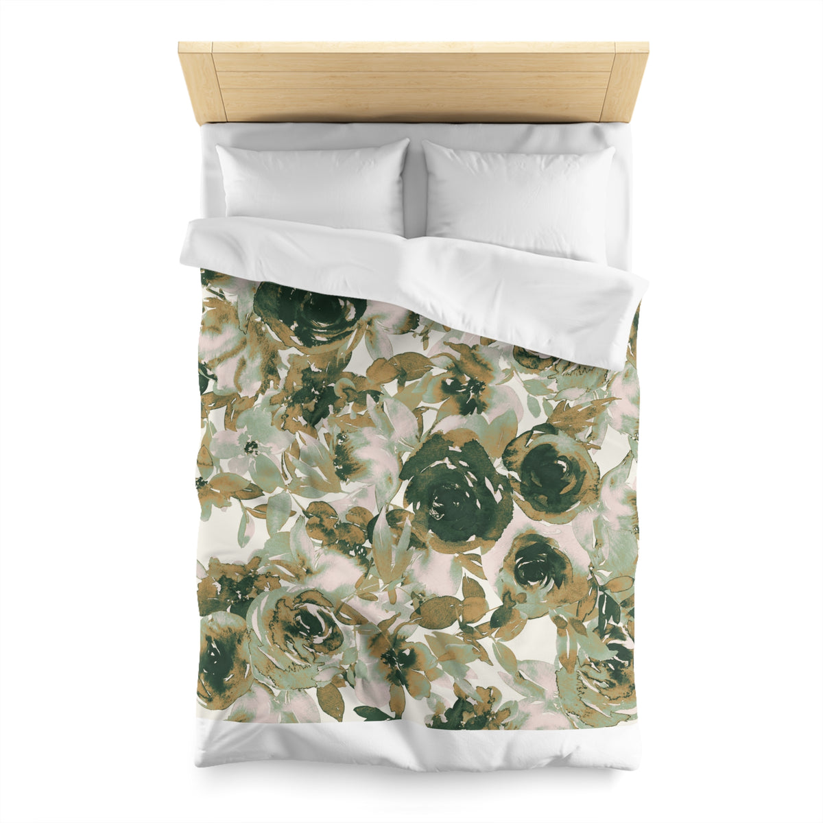 a bed with a floral print duvet cover and pillows.