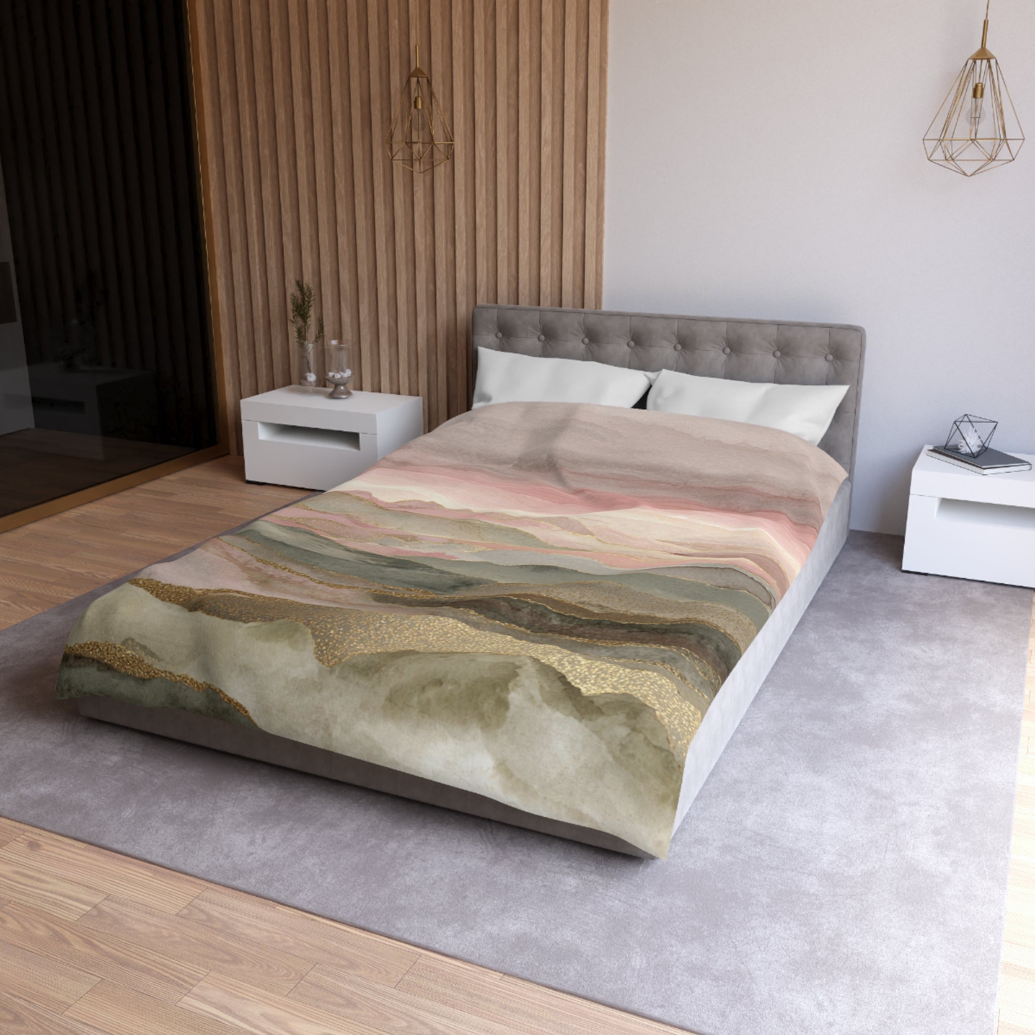 a modern bedroom with a large bed, a gray headboard, and a colorful bedspread featuring a mountain landscape design.
