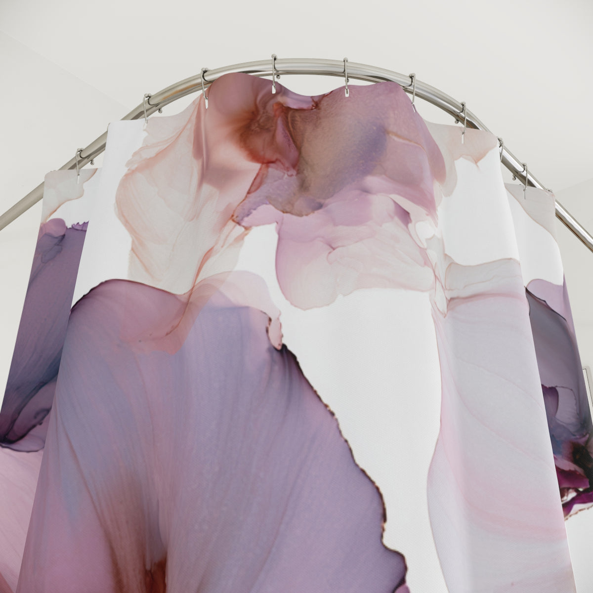 a large, abstract floral pattern with a mix of pink and purple colors, creating a visually striking and dynamic design.