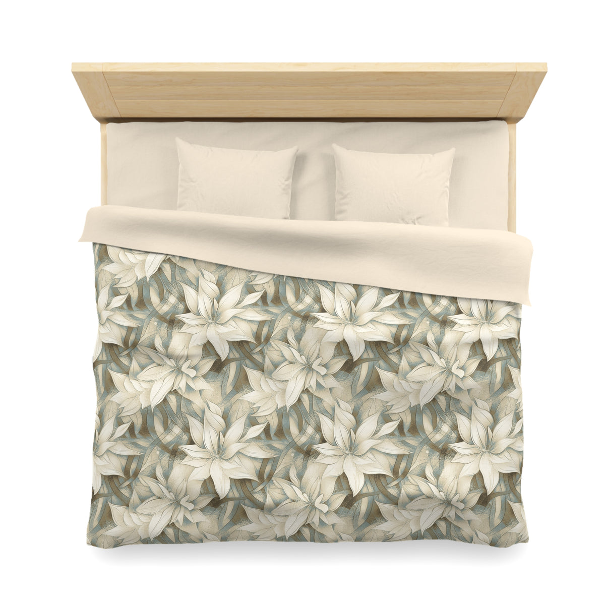 a neatly made bed with a floral patterned comforter and pillows.