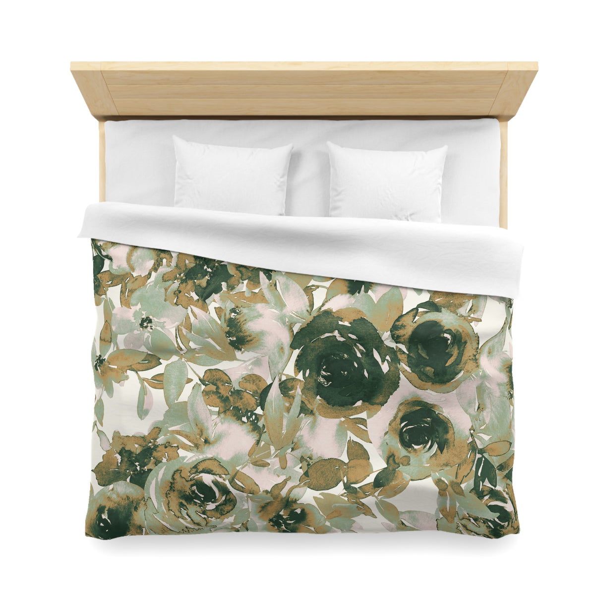 a bed with a floral print duvet cover and white pillows.