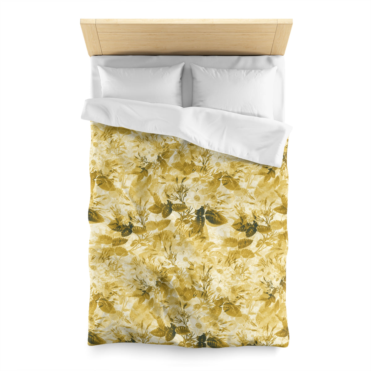 a bed with a yellow and green floral patterned comforter and pillows.