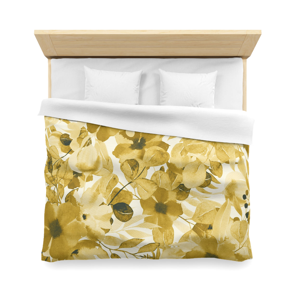 a bed with a floral print duvet cover and white pillows.