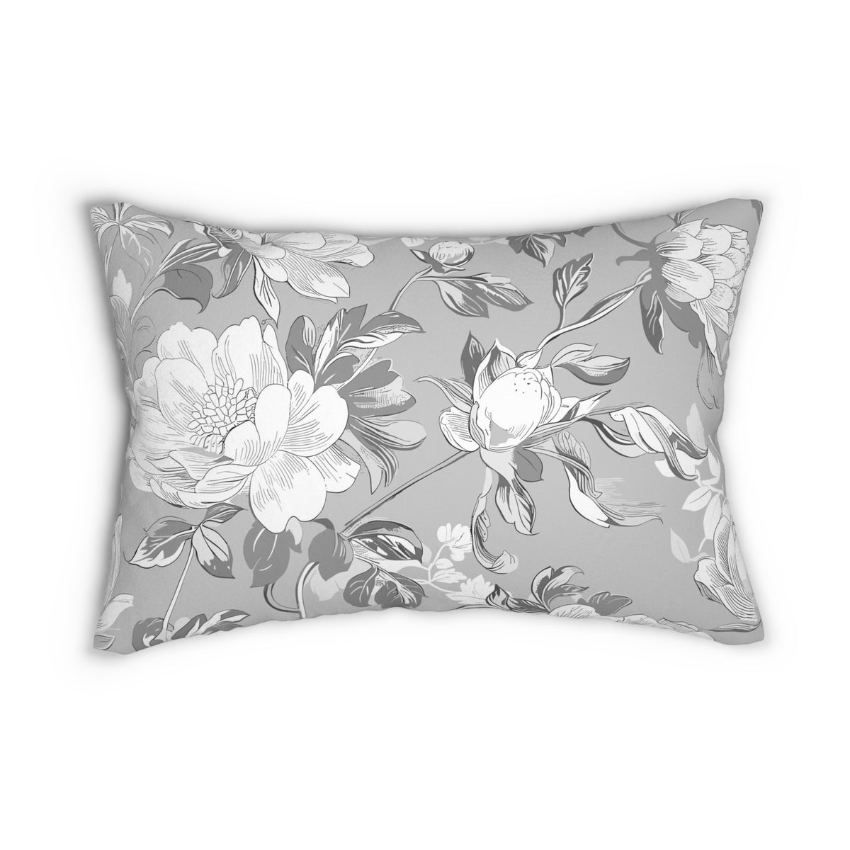 a gray and white floral pattern on a pillow.
