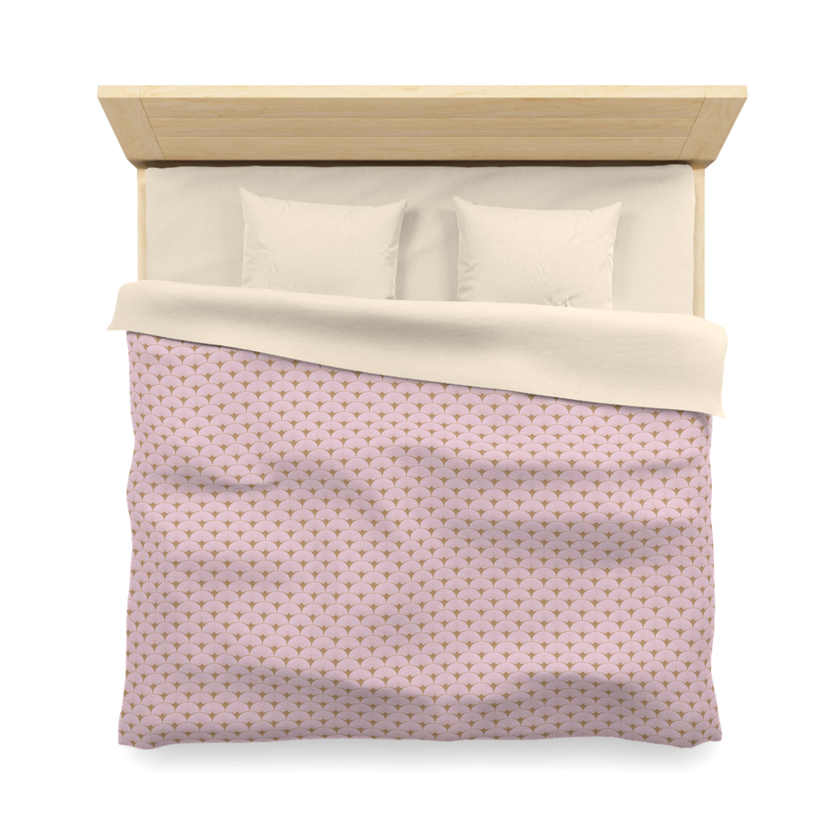 A neatly made bed with a pink and white patterned comforter and two pillows.