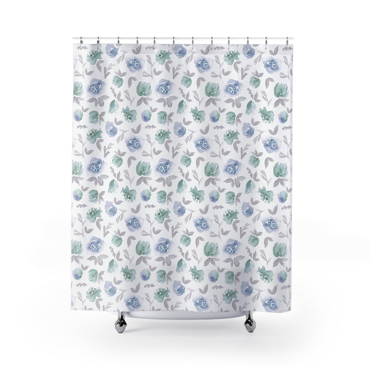 a white shower curtain with a repeating pattern of blue and green flowers and leaves.