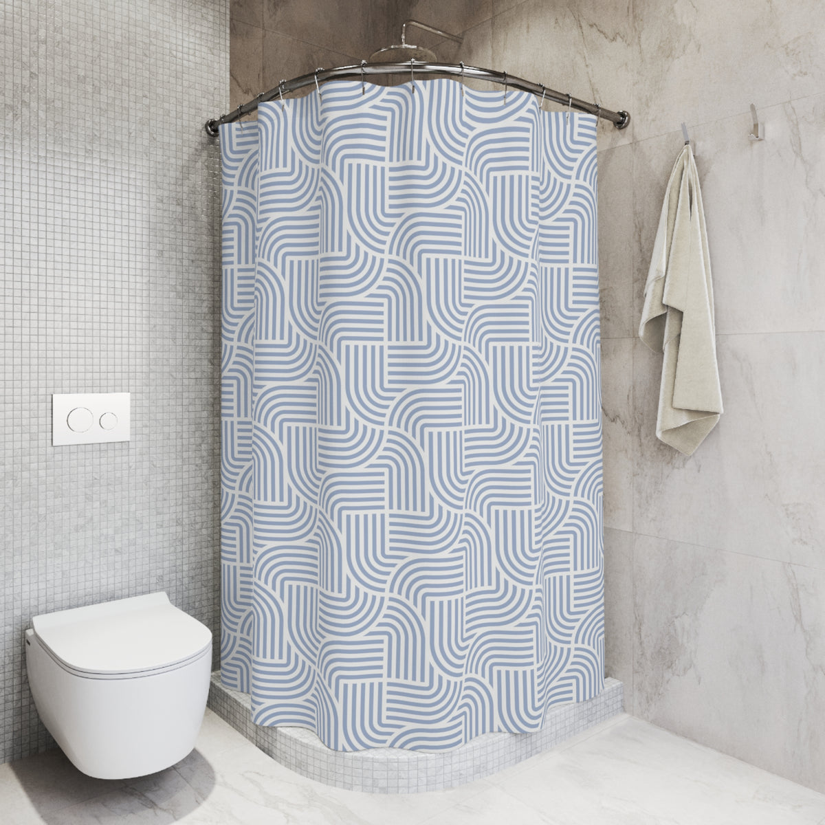 a modern bathroom with a white toilet, a shower with a blue and white patterned shower curtain, and a towel hanging on a rack.