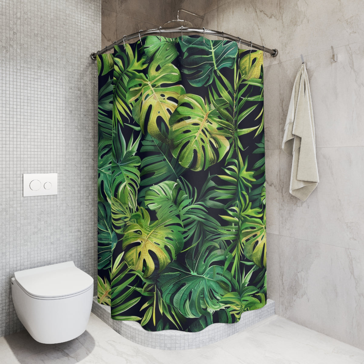 a bathroom with a shower curtain adorned with a tropical leaf pattern in shades of green and yellow. The shower curtain is hanging from a rod next to a towel. The bathroom has a white toilet and a tiled wall, creating a clean and modern aesthetic.