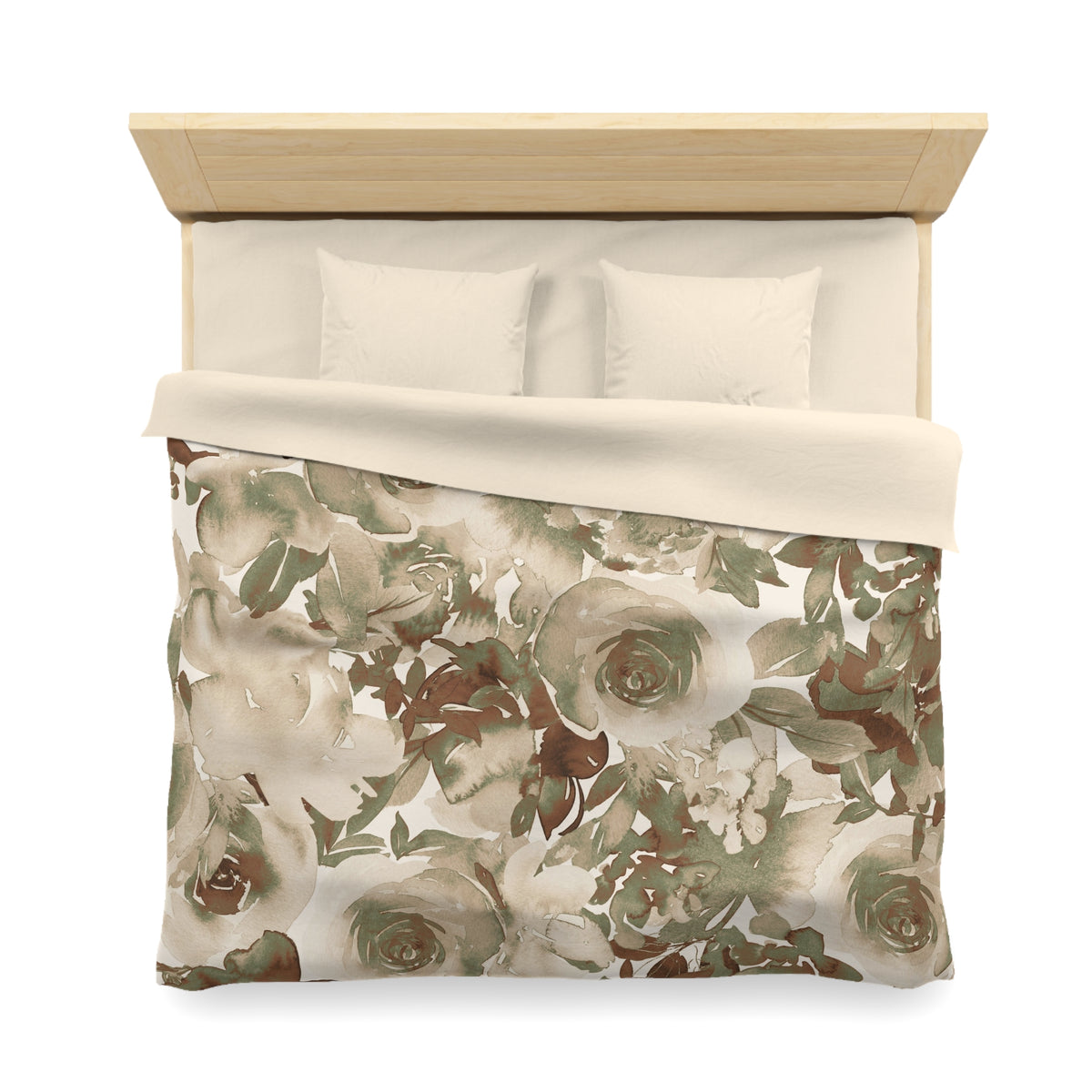 a neatly made bed with a floral print bedspread and two pillows.