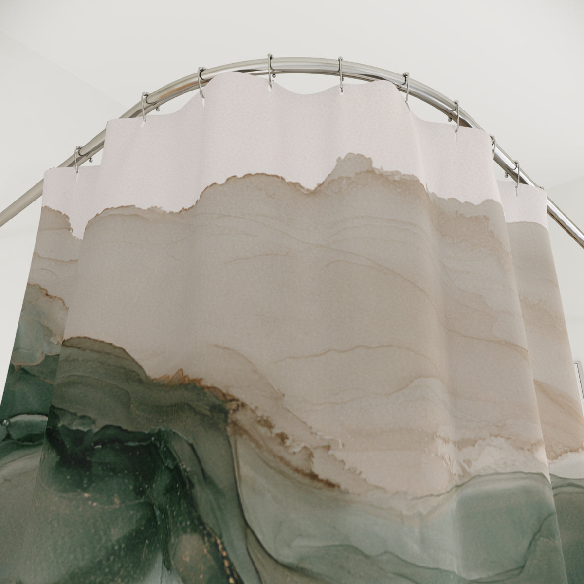 a shower curtain with a marble-like pattern in shades of green and beige.