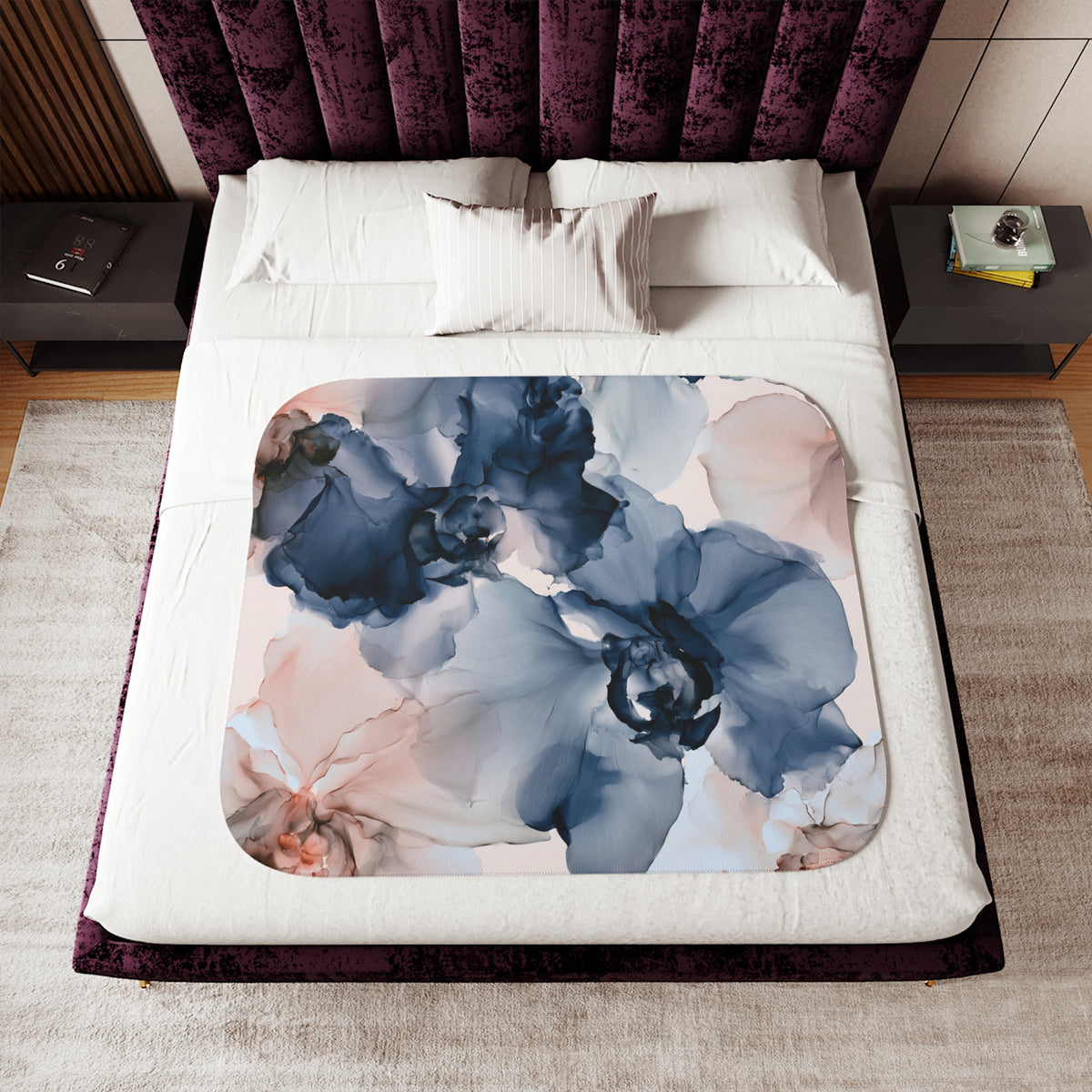 a bed with a purple headboard and a floral comforter