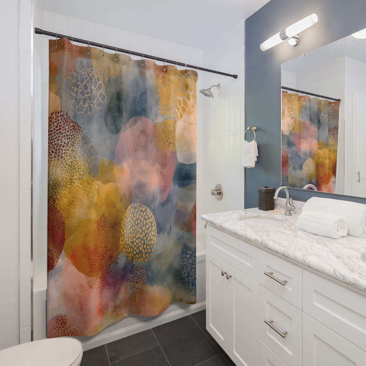 a modern bathroom with a white vanity, a colorful abstract shower curtain, and a mirror above the vanity.
