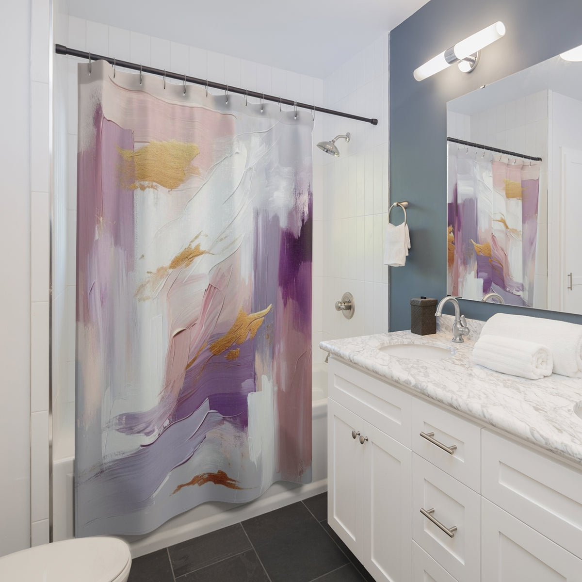 a modern bathroom with a white vanity, a shower curtain with a colorful abstract design, and a mirror above the vanity.