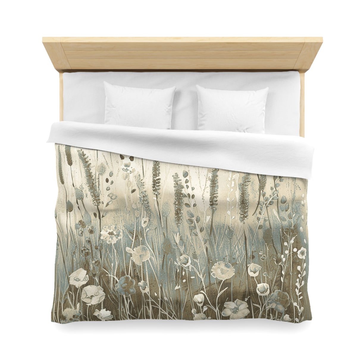 a neatly made bed with a floral patterned comforter and pillows.