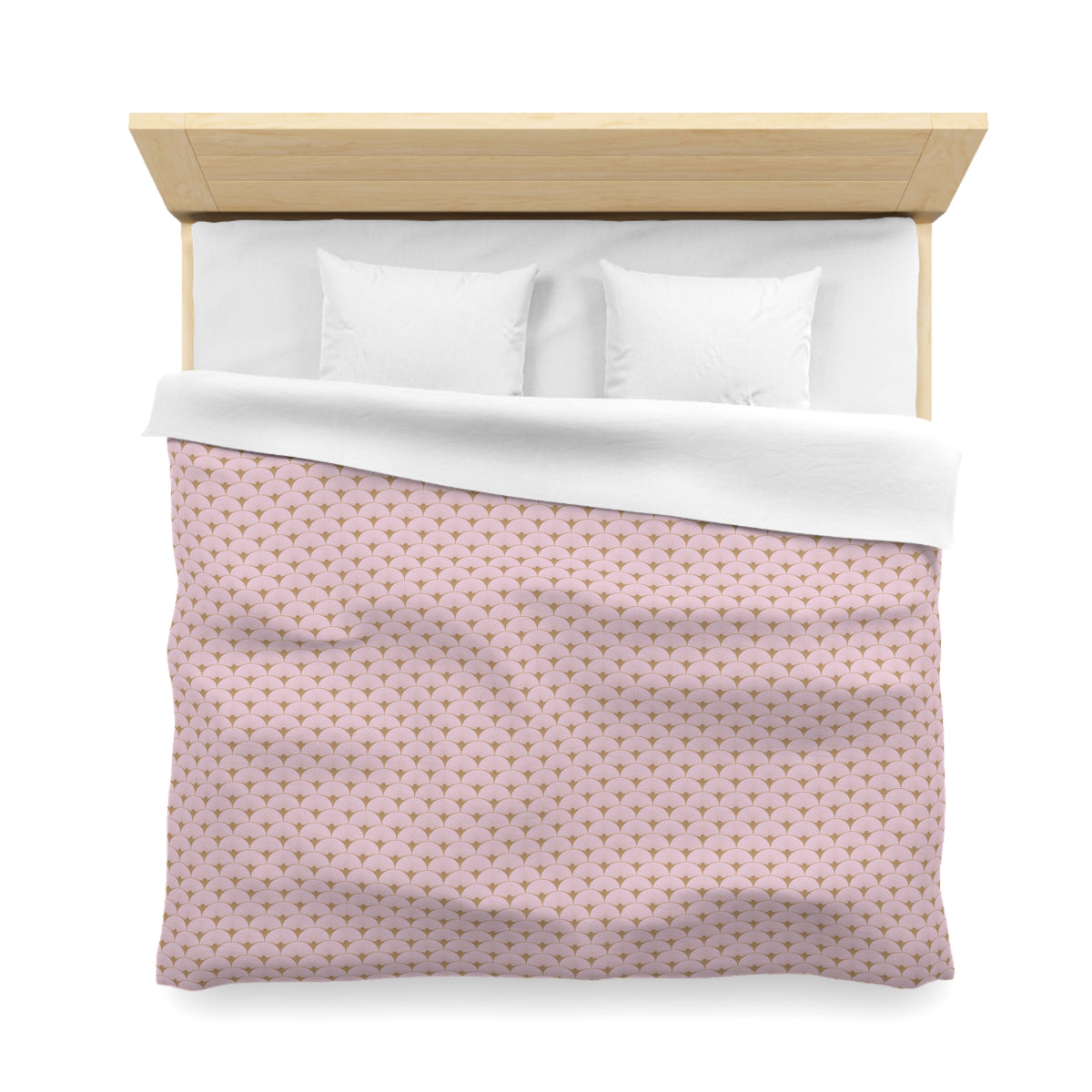 A neatly made bed with a pink and white patterned comforter and two white pillows.