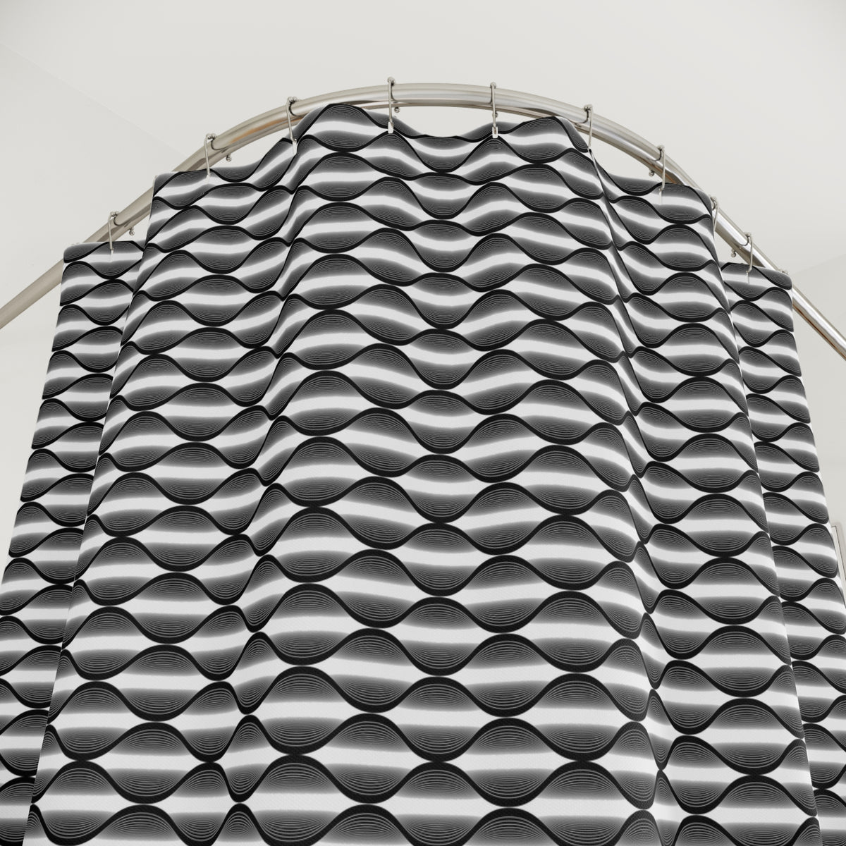 a curved metal structure with a repeating pattern of black and white stripes.