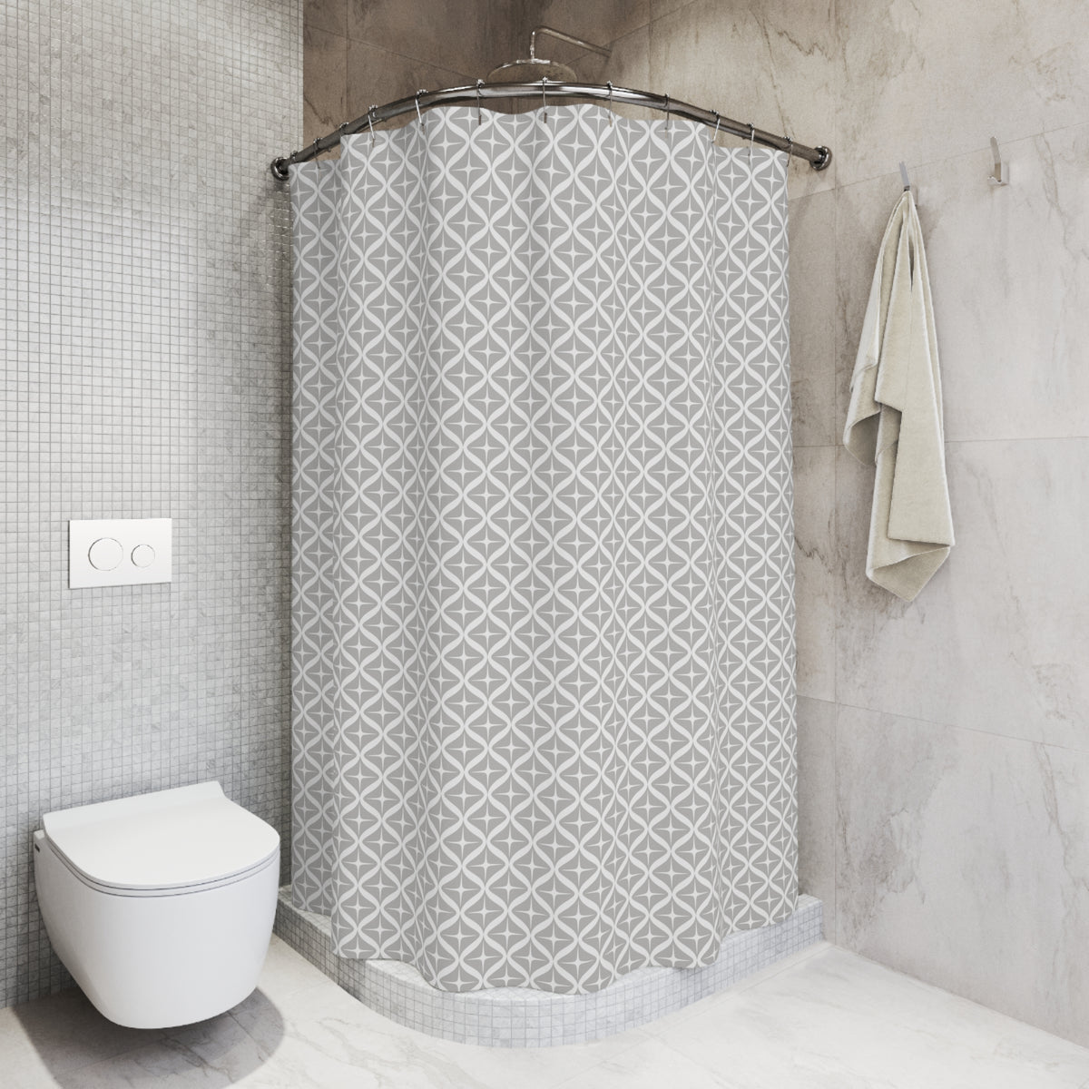 a modern bathroom with a white toilet, a shower with a gray patterned shower curtain, and a towel hanging on a rack.