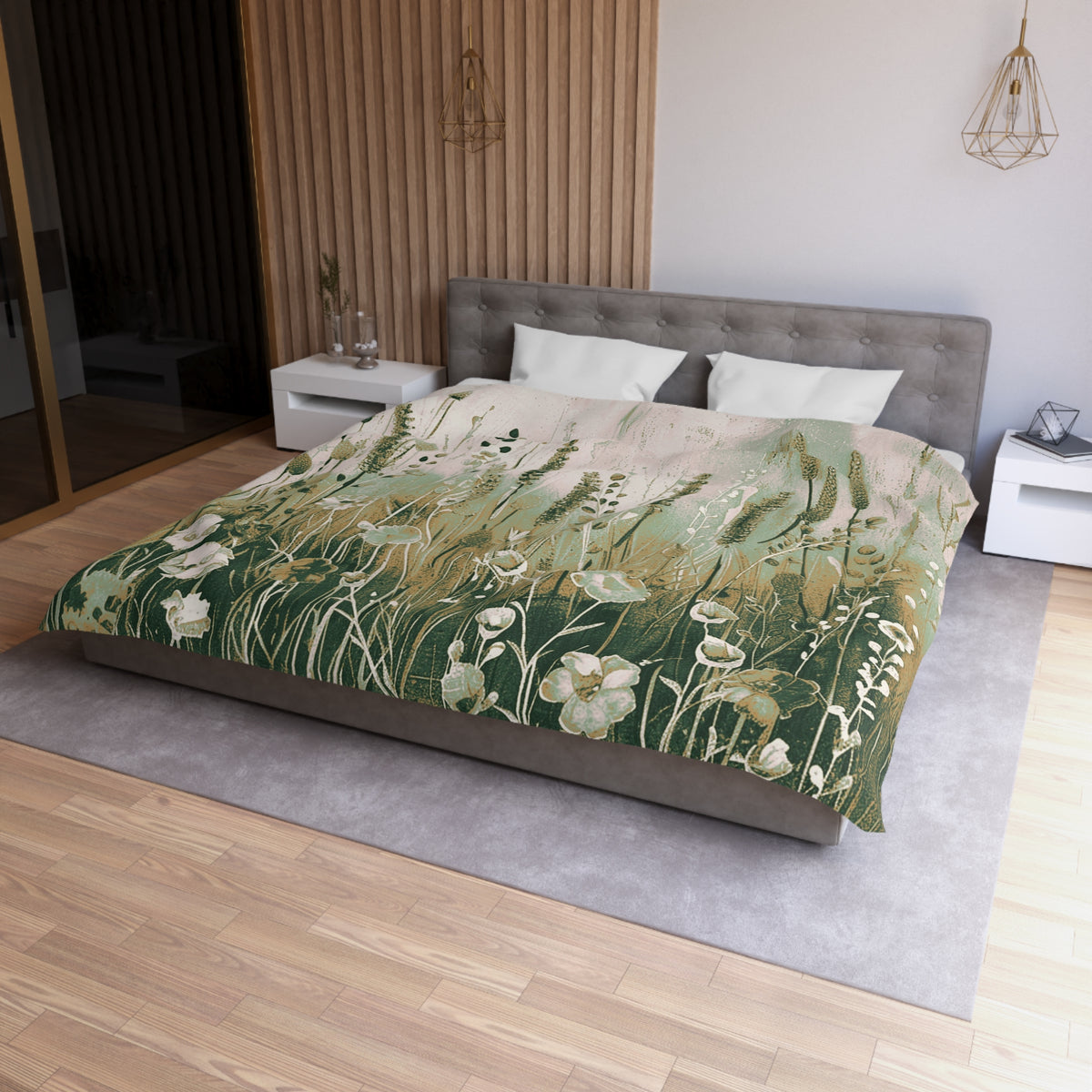a bedroom with a large bed covered in a green and white floral comforter. The bed is positioned against a wall with a wooden panel. The room has a modern and minimalist design, with a gray headboard and white nightstands.