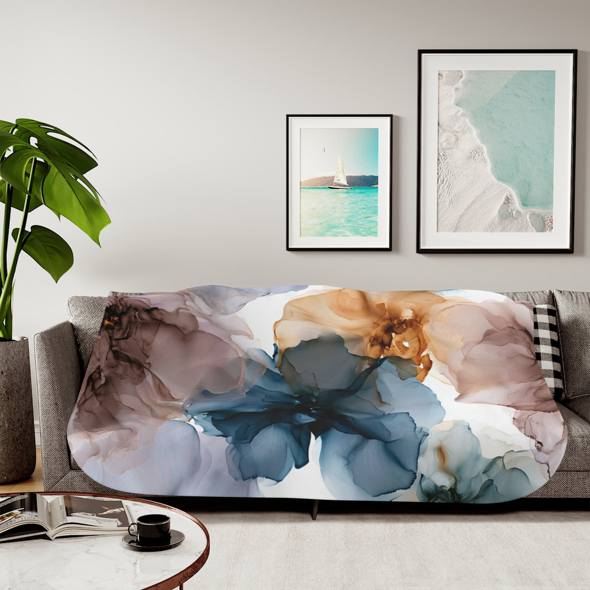 a living room with a couch covered in a blanket