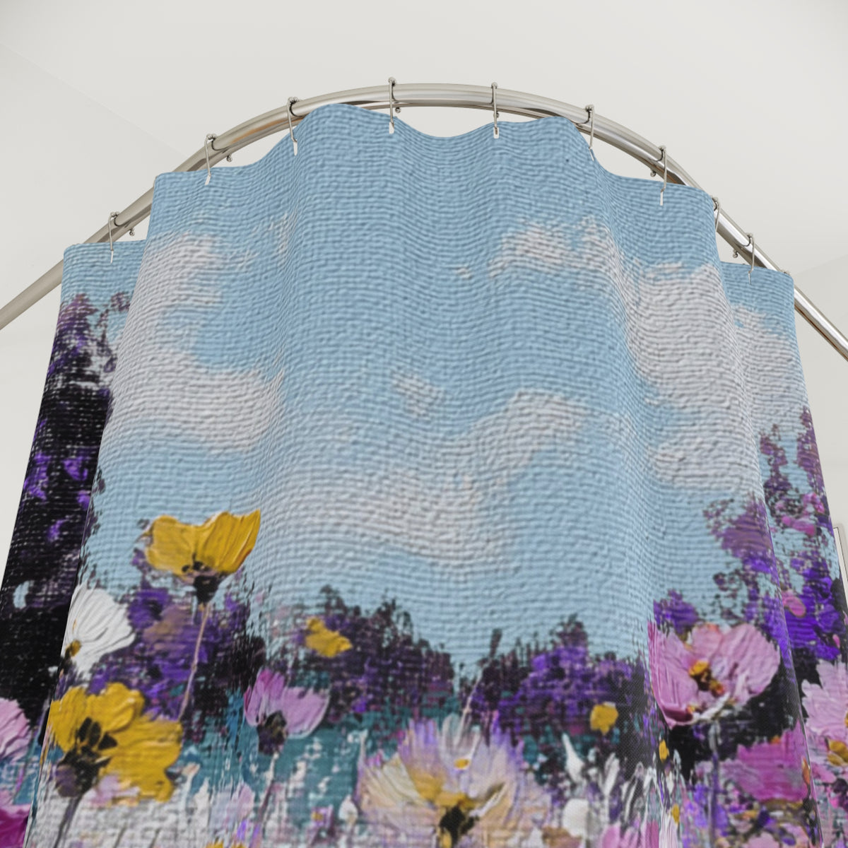 a vibrant floral pattern with purple and yellow flowers, set against a blue sky with fluffy white clouds.