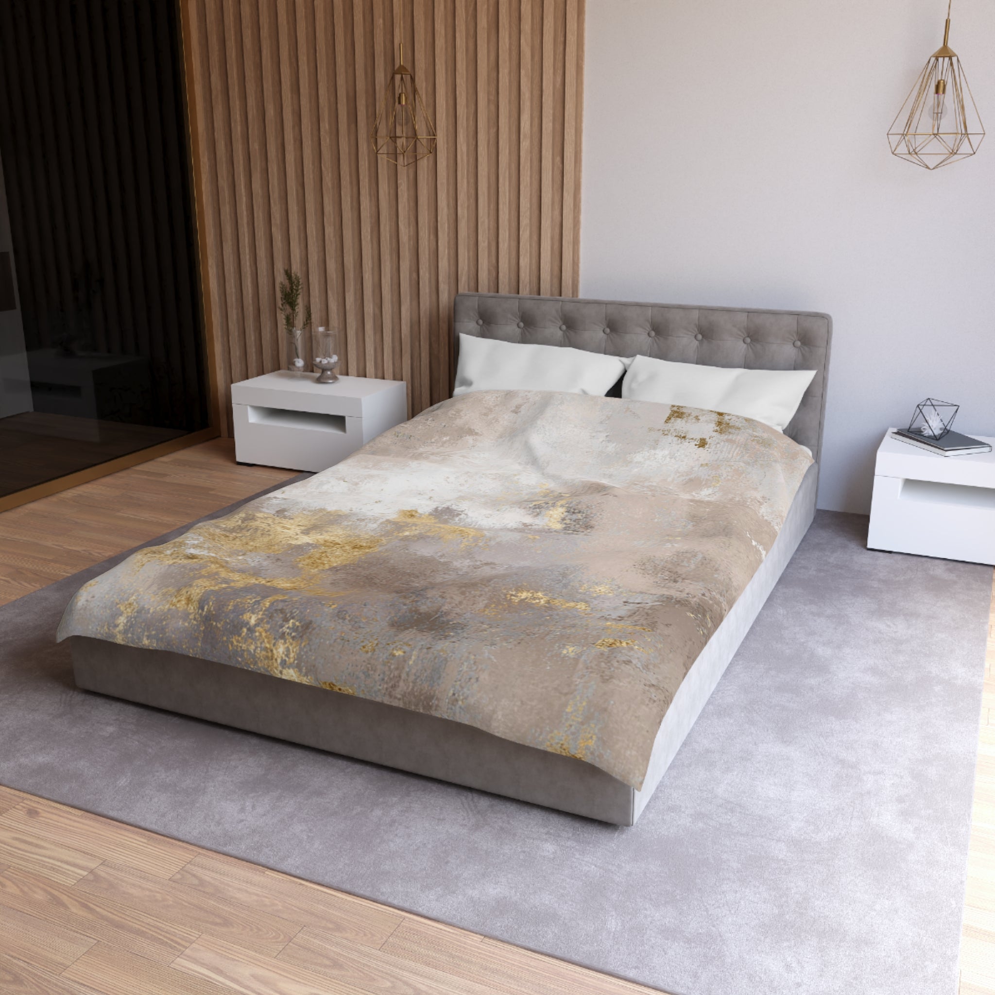 a modern bedroom with a large bed, white nightstands, and a wooden wall. The bed has a gray headboard and a gray comforter with a gold and white abstract design. The room has a neutral color scheme with a gray carpet and white walls.