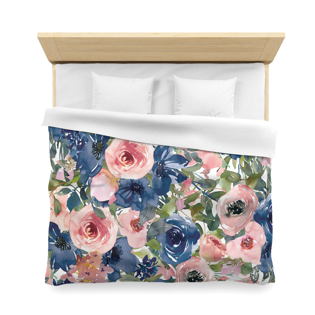 a bed with a floral print duvet cover featuring a variety of colorful flowers, including roses, lilies, and other blooms.