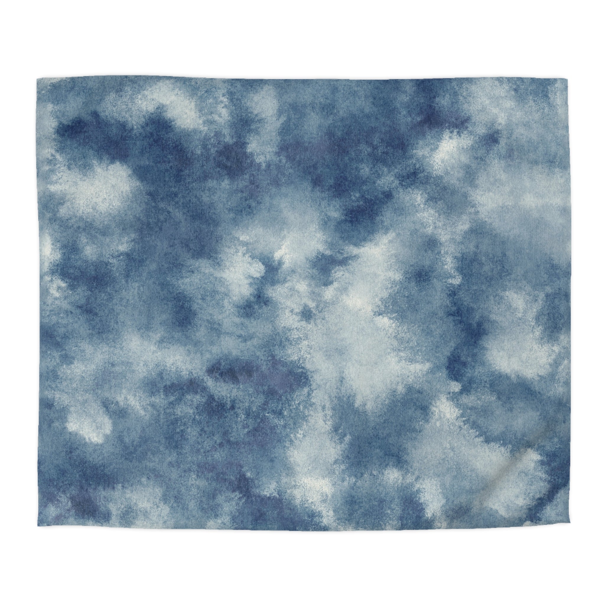 The image is a square-shaped fabric with a blue and white abstract pattern, resembling a watercolor painting.