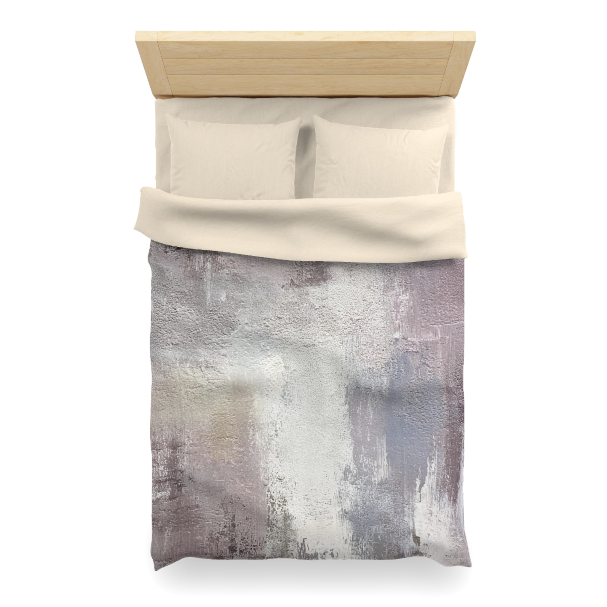 a neatly made bed with a wooden headboard and a comforter with a textured, abstract design in shades of gray and white.
