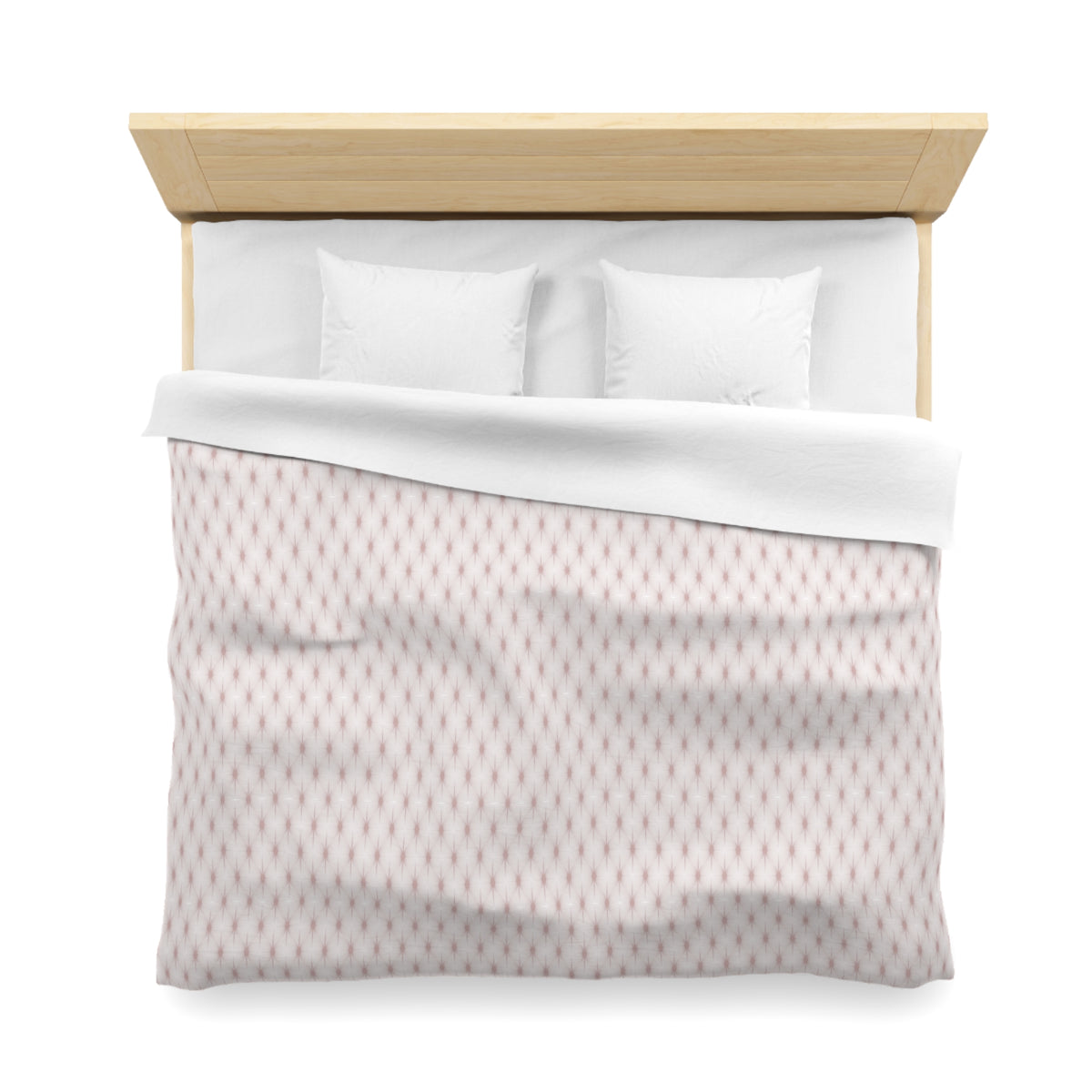 A neatly made bed with a wooden headboard and a white comforter with a patterned design.