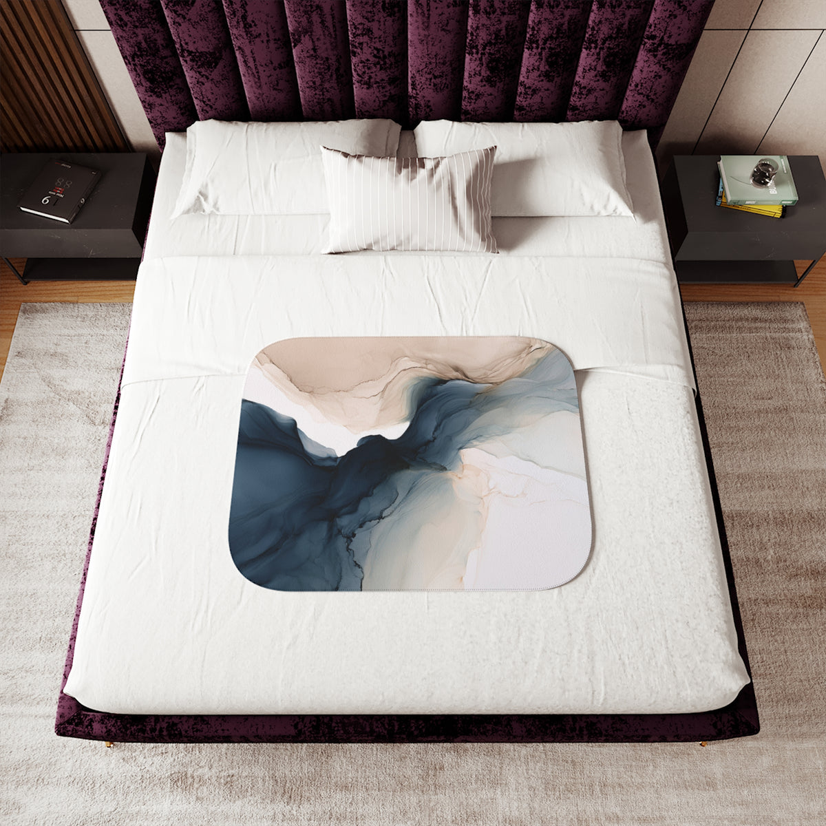 a bed with a purple headboard and white sheets