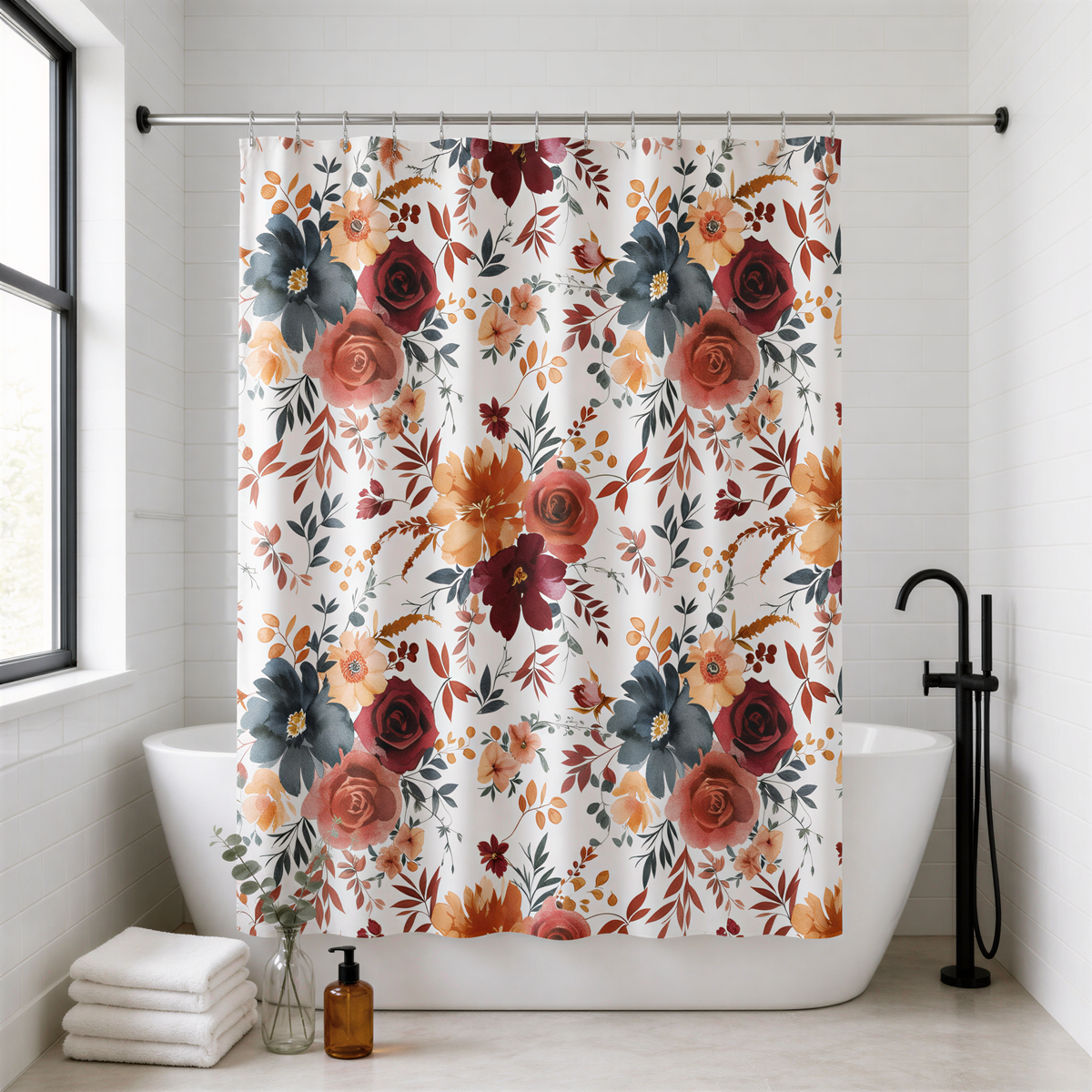a bathroom with a floral shower curtain hanging above a white bathtub. The shower curtain has a vibrant floral pattern in shades of orange, red, and blue. The bathroom also includes a window, a black faucet, and some decorative elements such as a bottle and a vase.